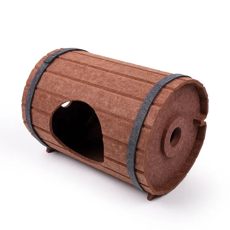 Assembled wine barrel cat bed with three felt panels forming circular pet nest