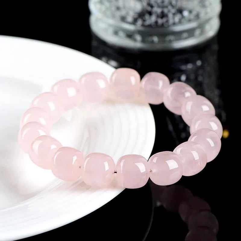 Pink natural bamboo crystal bracelet with 11mm geometric barrel beads