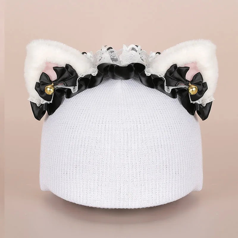 Plush fabric cartoon character decorative cover on a ski helmet.