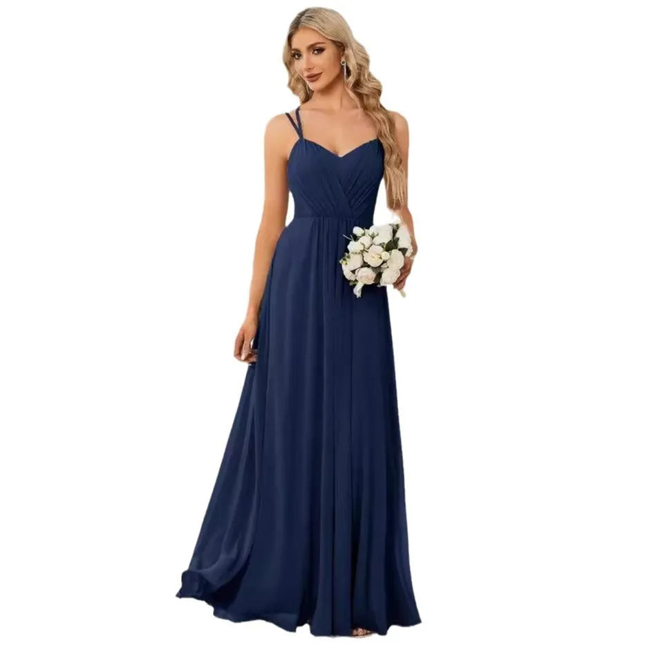Long pleated A-line dress in light green with sleeveless sling neckline design.
