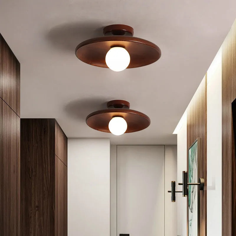 Solid wood ceiling lamp with glass shade in minimalist circular design