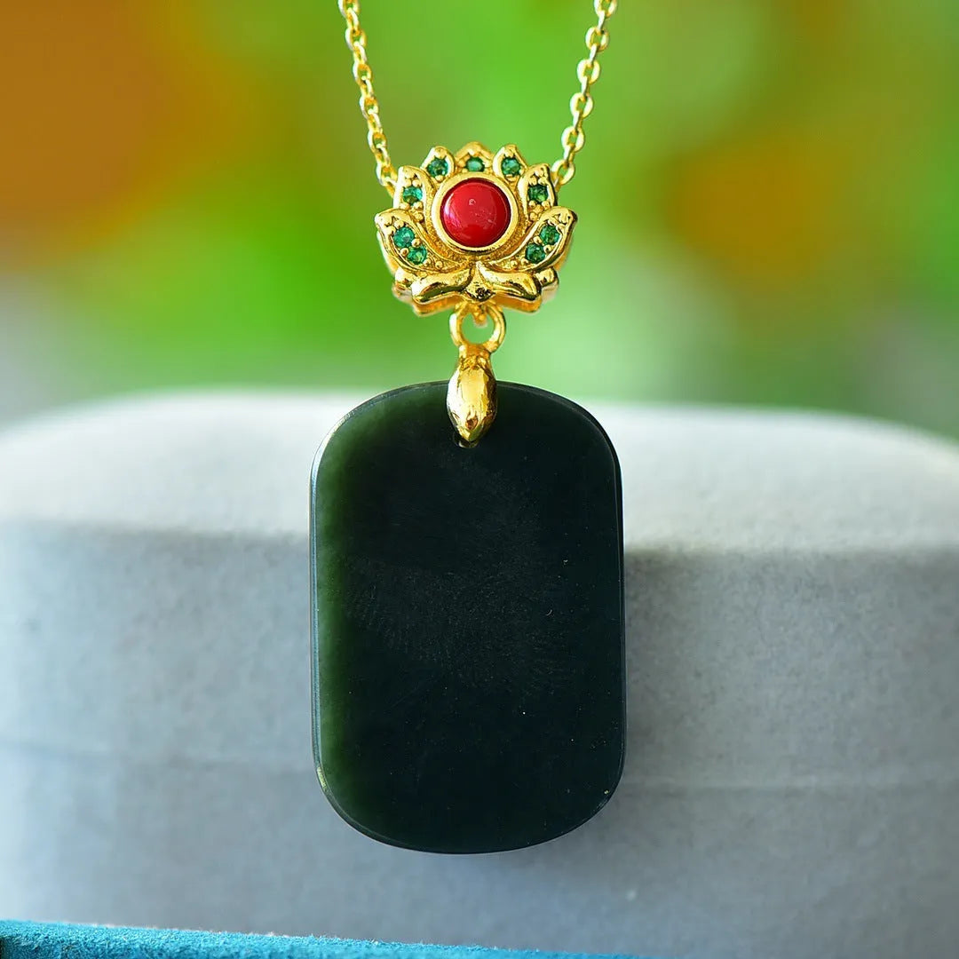Natural Hetian grey jade pendant with copper inlaid detailing and ink blue jade accents on silver necklace chain