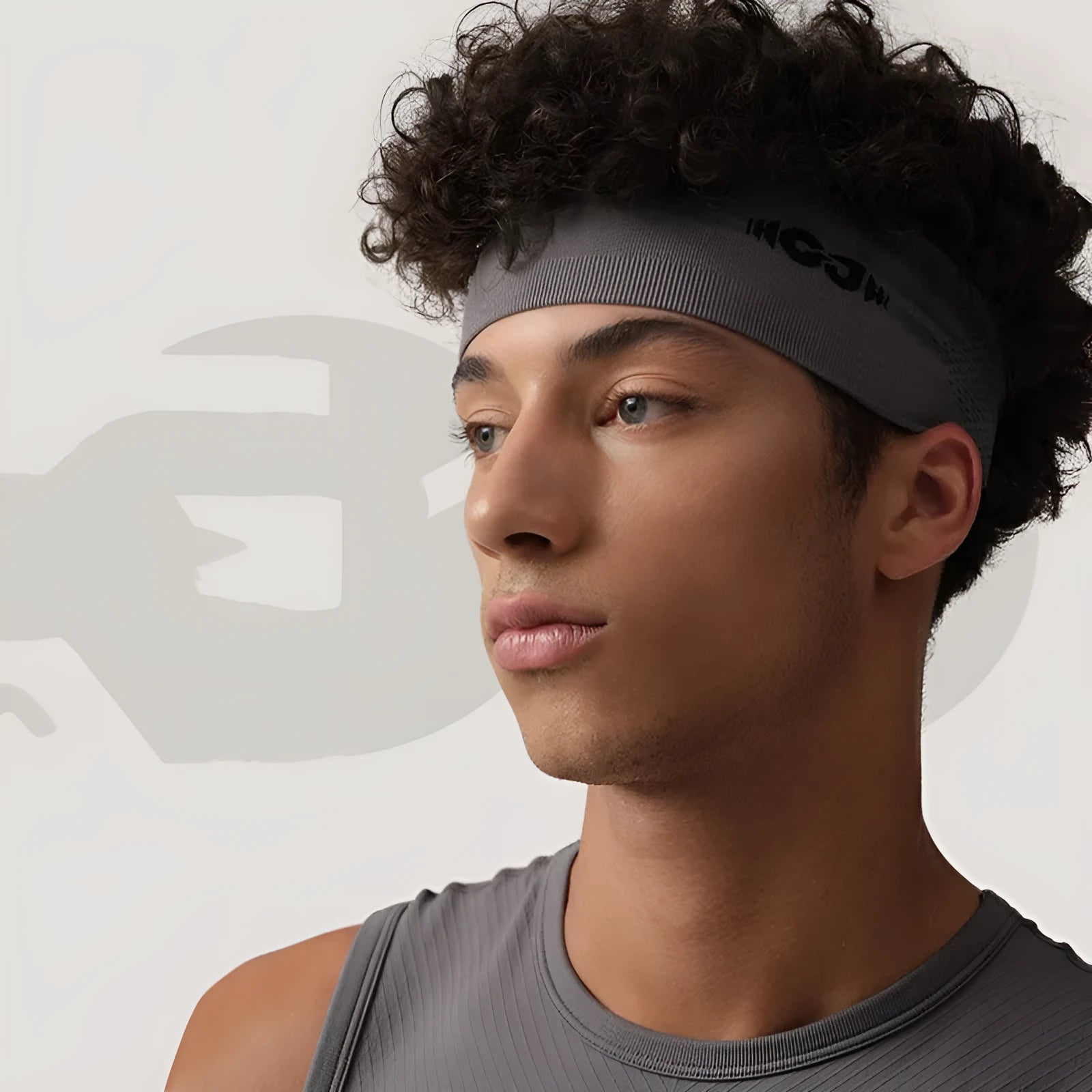 Seamless knitted exercise hair band for sports in Classic Black, Carbon Gray, and Purplish blue.