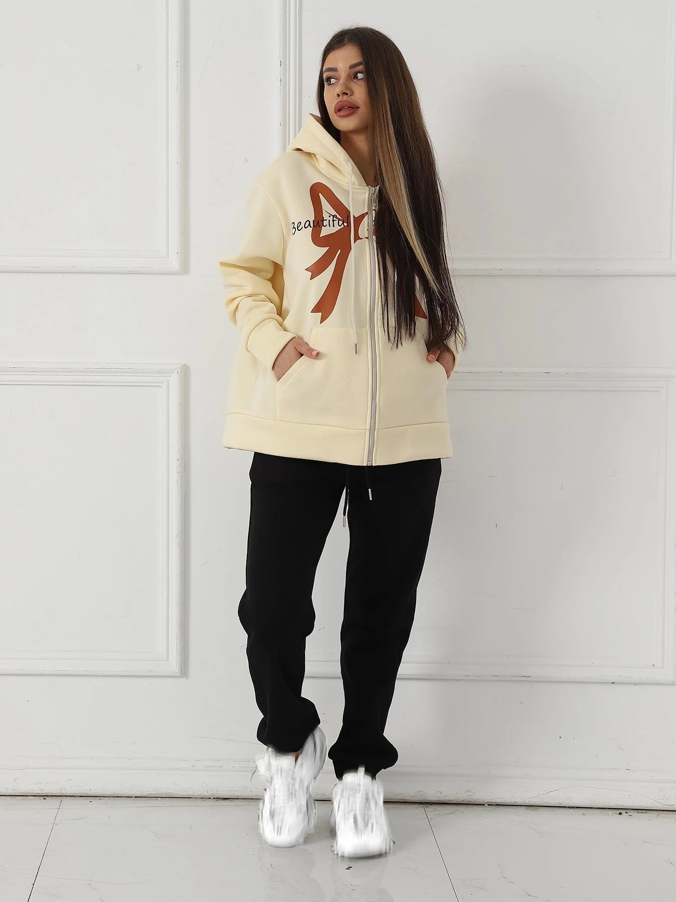 Women's long sleeved sweatshirt in apricot and brown, sizes S to XXL