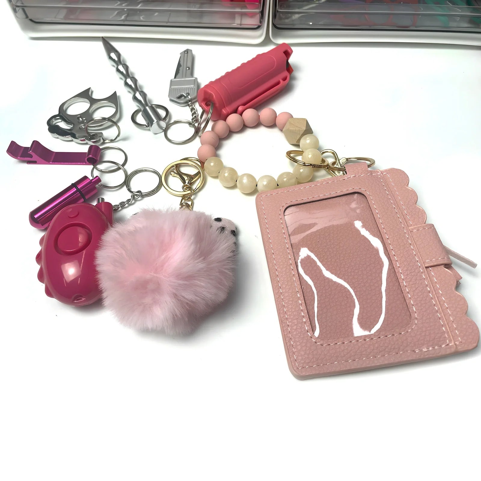 Beaded card bag set with wool ball, 130dB alarm, spray, key knife, and bottle opener components