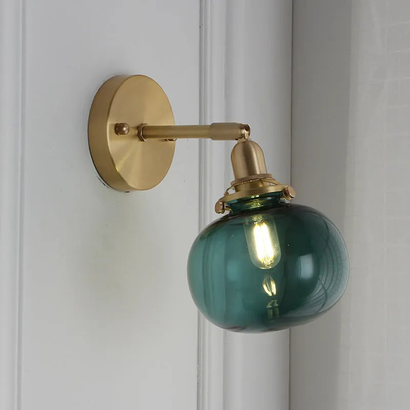 Pumpkin-shaped decorative glass wall lamp in water ripple transparent or solid blue finish.