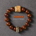 Ivory nut lion style round bead bracelet with 13mm natural seed beads in hand-woven construction
