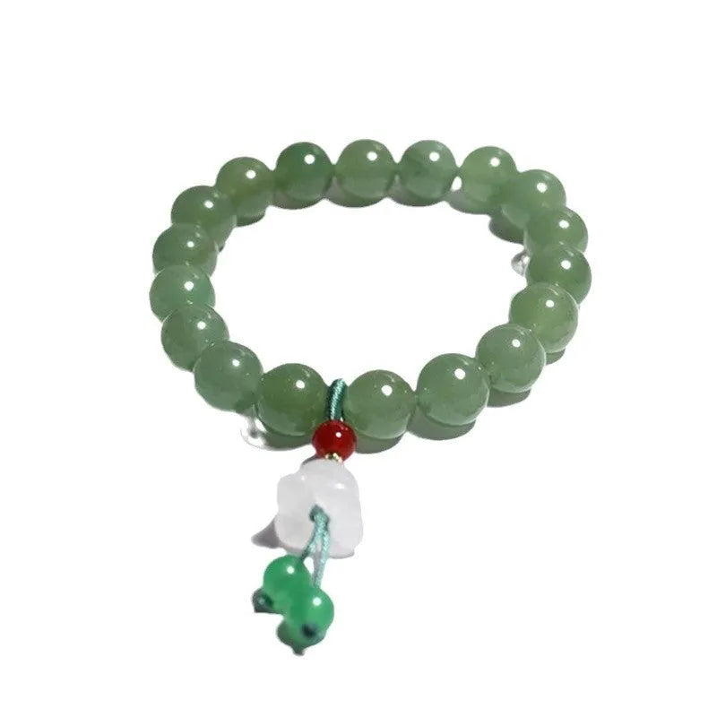 Natural white agate round beads bracelet with lotus seedpod design and Tian Shan Cui old beads