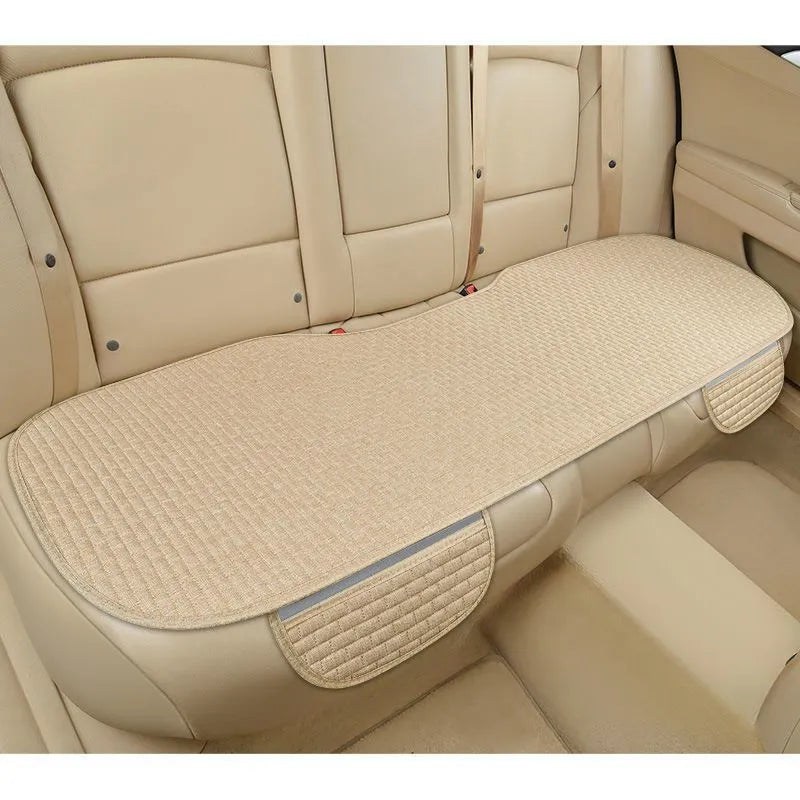 Linen fabric car seat cushion in a hemming style, shown in charm coffee colour on a car seat.