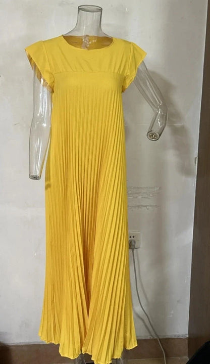 Women's summer pleated long dress in various colours, showcasing the unique design and flattering silhouette.