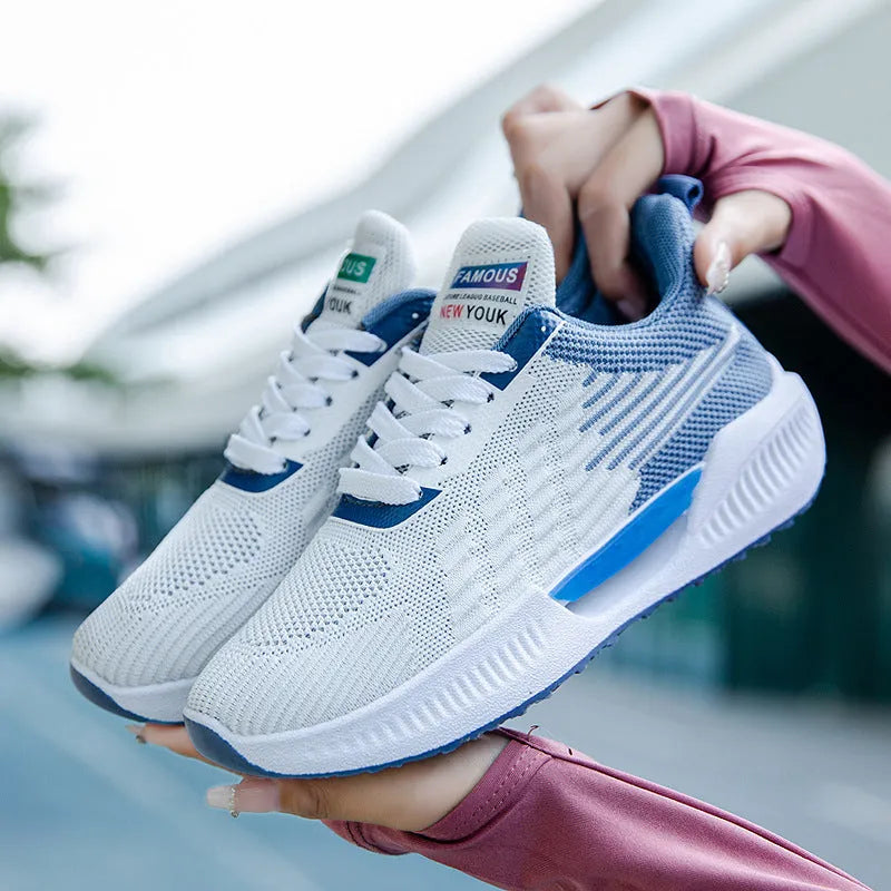 Blue men's casual mesh sports shoes with a round toe and plastic sole, shown on a white background.