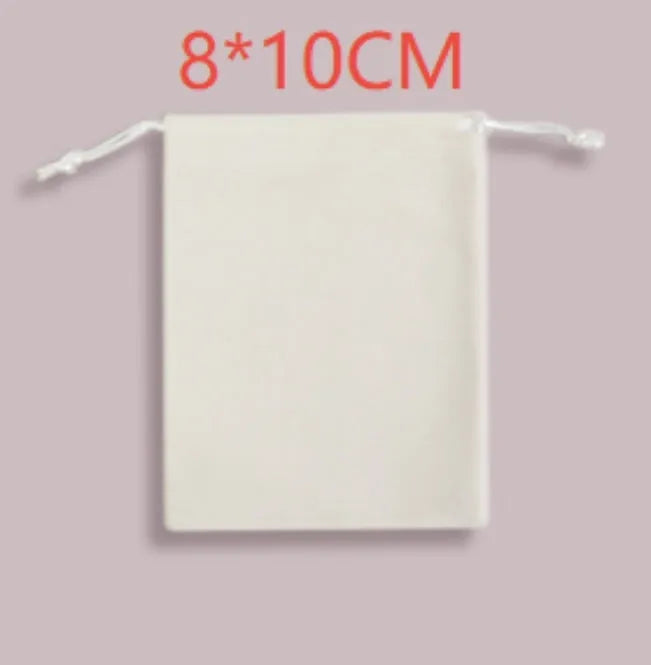 White 8x10cm fabric drawstring storage bag on plain background