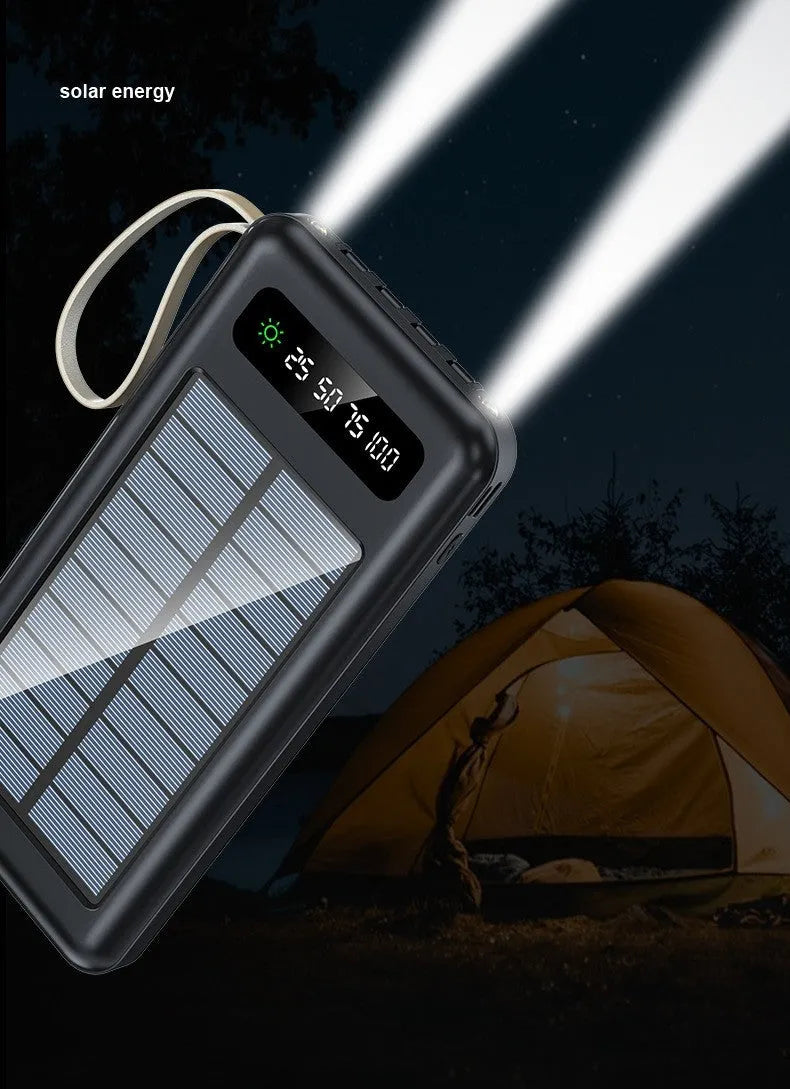 Cool black solar power bank showing its solar panel and output ports on a compact rectangular body.