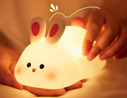 Cozy silicone sheep night light with adjustable brightness, auto-off timer, and USB charging for children's bedroom decor