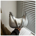Women's dumpling-shaped shoulder baguette handbag in PU material with single strap and mobile phone compartment