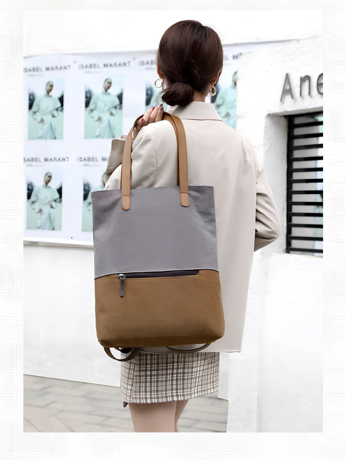 Canvas tote bag in black converts to backpack, 30x10x39cm size with zipper and polyester lining
