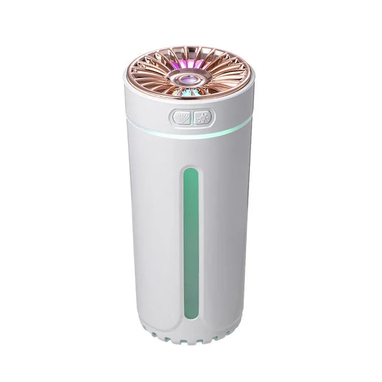 Compact black wireless USB humidifier with colourful LED lights on a car cup holder.