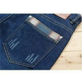 Men's slim-fit stretch skinny pants in dark blue denim, mid-rise, zipper fly
