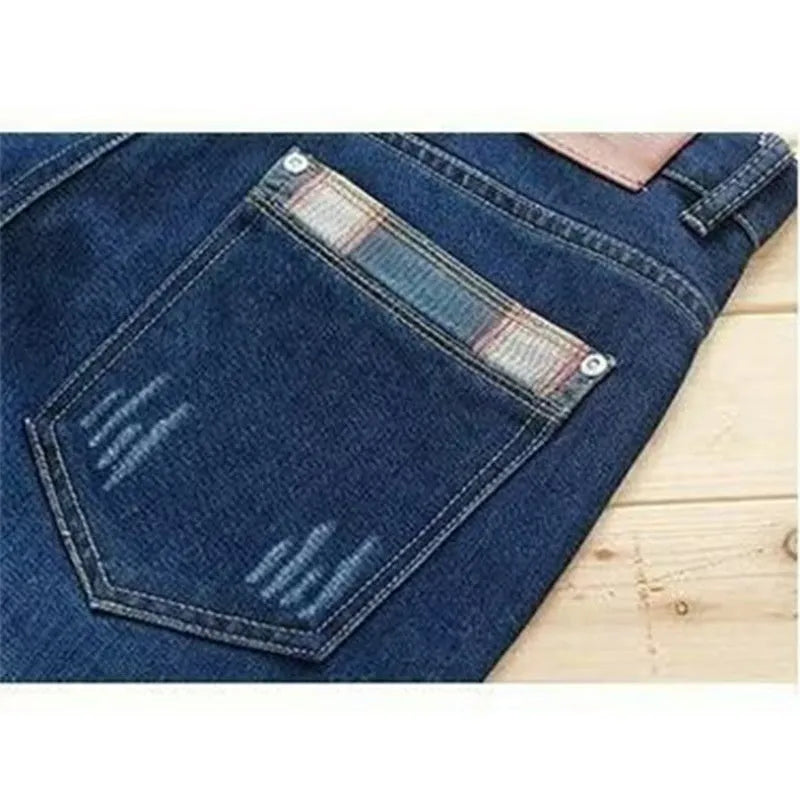 Men's slim-fit stretch skinny pants in dark blue denim, mid-rise, zipper fly