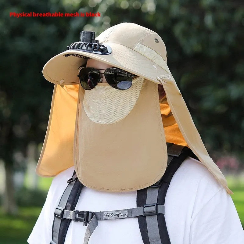Man wearing a khaki sun hat with a built-in USB-rechargeable fan for face and neck protection.