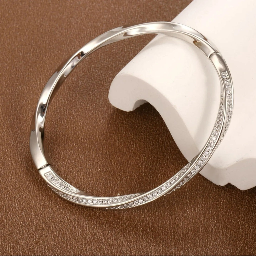 Real gold plated brass Mobius bracelet with half circle full diamond design in champagne gold colour
