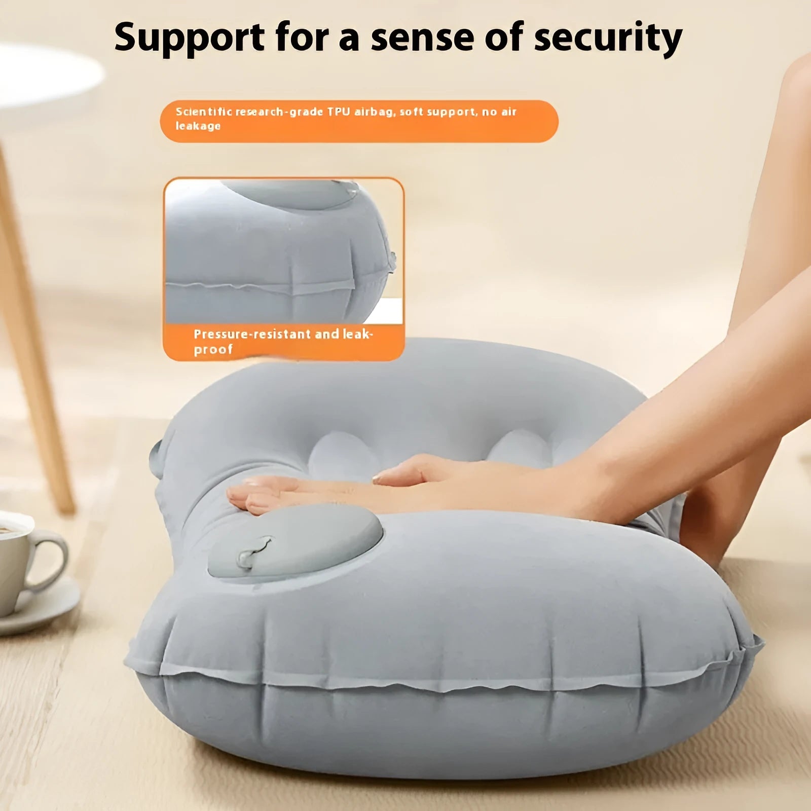 Grey flocking finish portable press inflatable travel pillow for neck support, shown deflated and inflated.