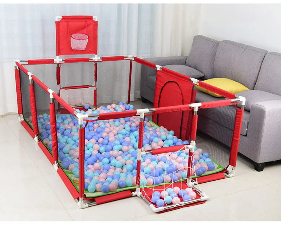 Large grey children's playpen with tent top and stainless steel frame in a living room