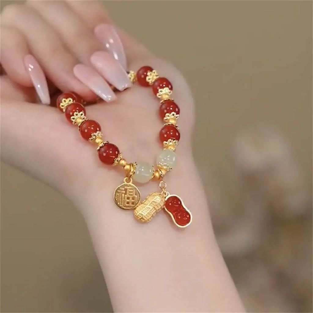 National style bracelet with rabbit charm, coloured glaze and glass beads, peace buckle clasp