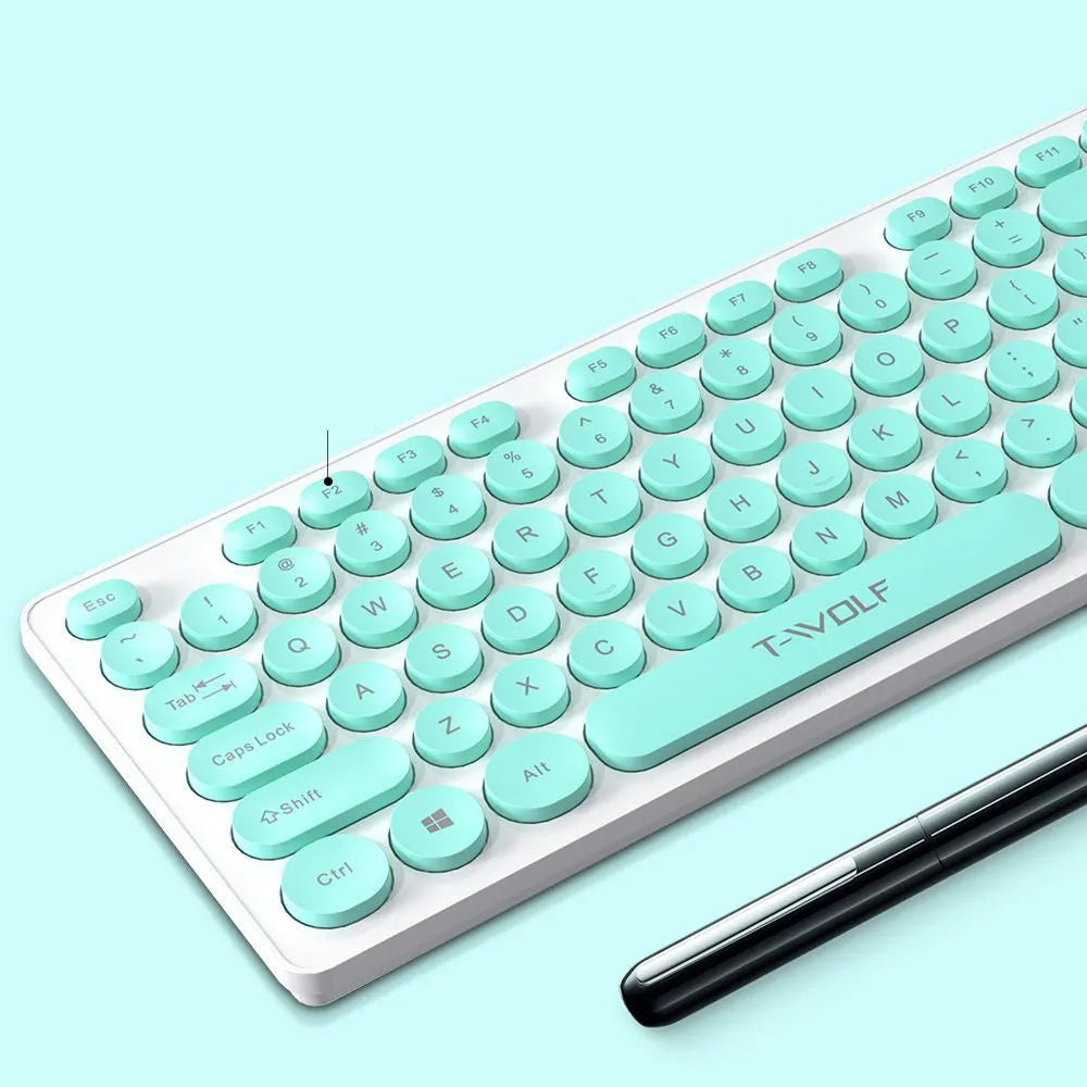 TF770 wireless keyboard and mouse set in light green with slim keyboard and compact mouse on a desk