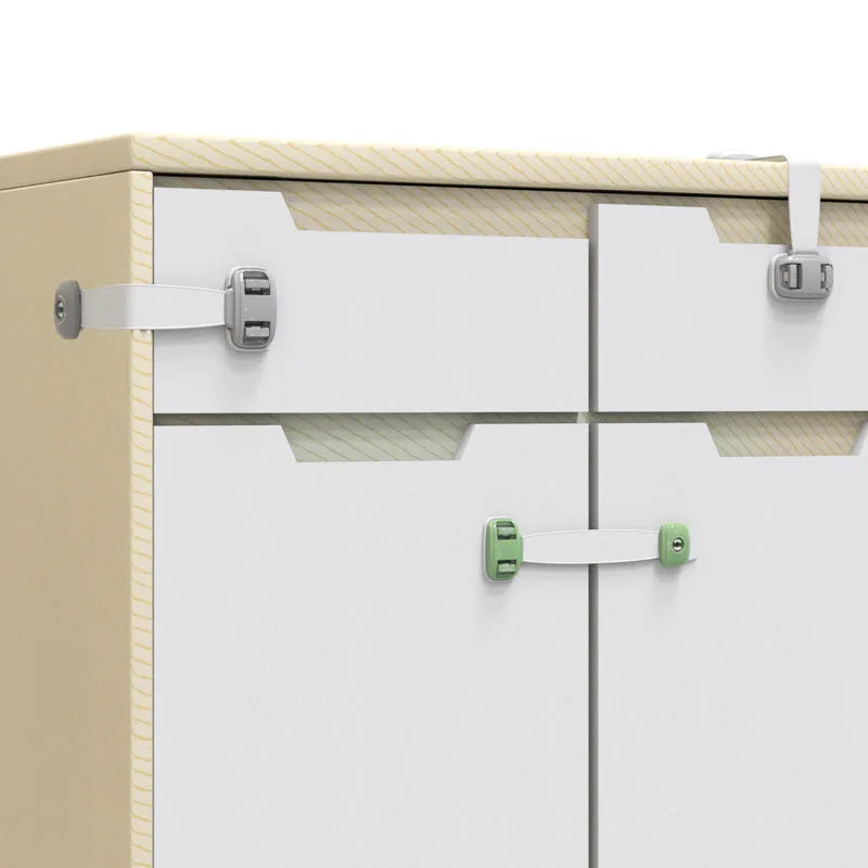 Adjustable child safety lock with strap shown securing a cabinet door using 3M adhesive
