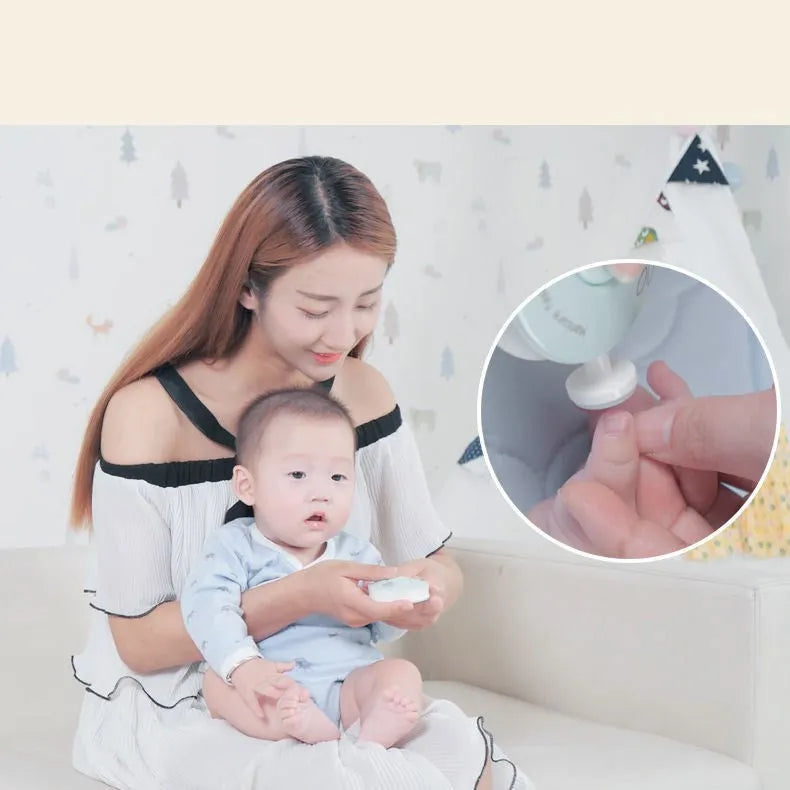 Baby electric nail polisher set in red or green with interchangeable grinding heads for infant and adult grooming