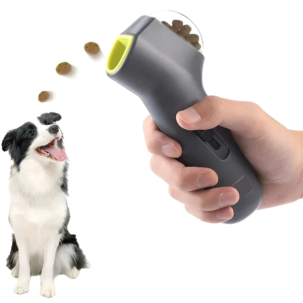 Grey plastic pet snack catapult launcher measuring 18cm with spring trigger mechanism