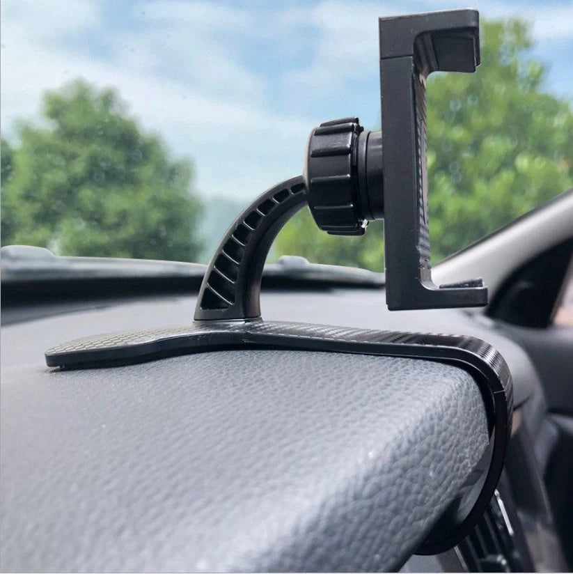 Dashboard-mounted car phone holder with adjustable ball head and stretchable silicone clip for conventional smartphones