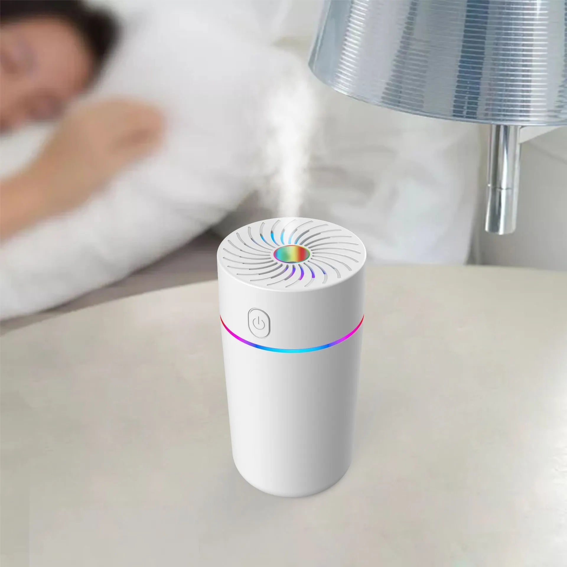 Compact white car USB humidifier with aromatherapy function placed on a car dashboard.