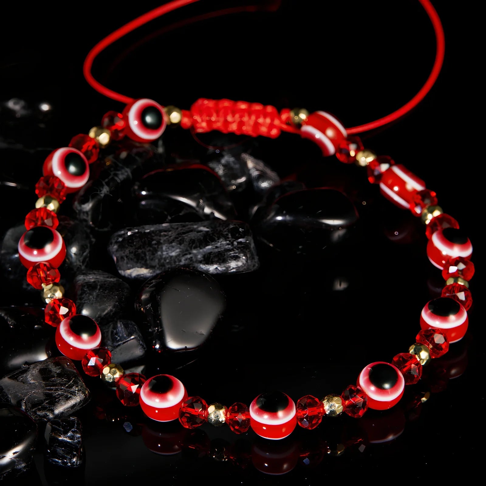 Adjustable crystal bead bracelet with blue eye design on braided rope, fits 15-19cm wrists