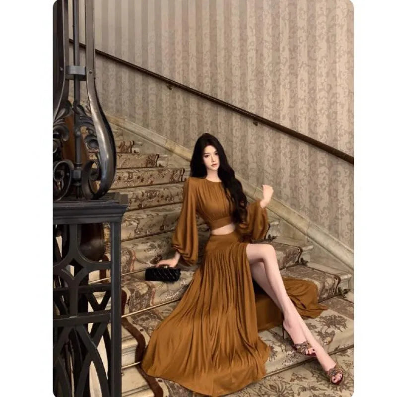 Women's batwing sleeve round neck top and pleating split long skirt suit in solid brown colour, polyester, Asian sizes S to 3XL