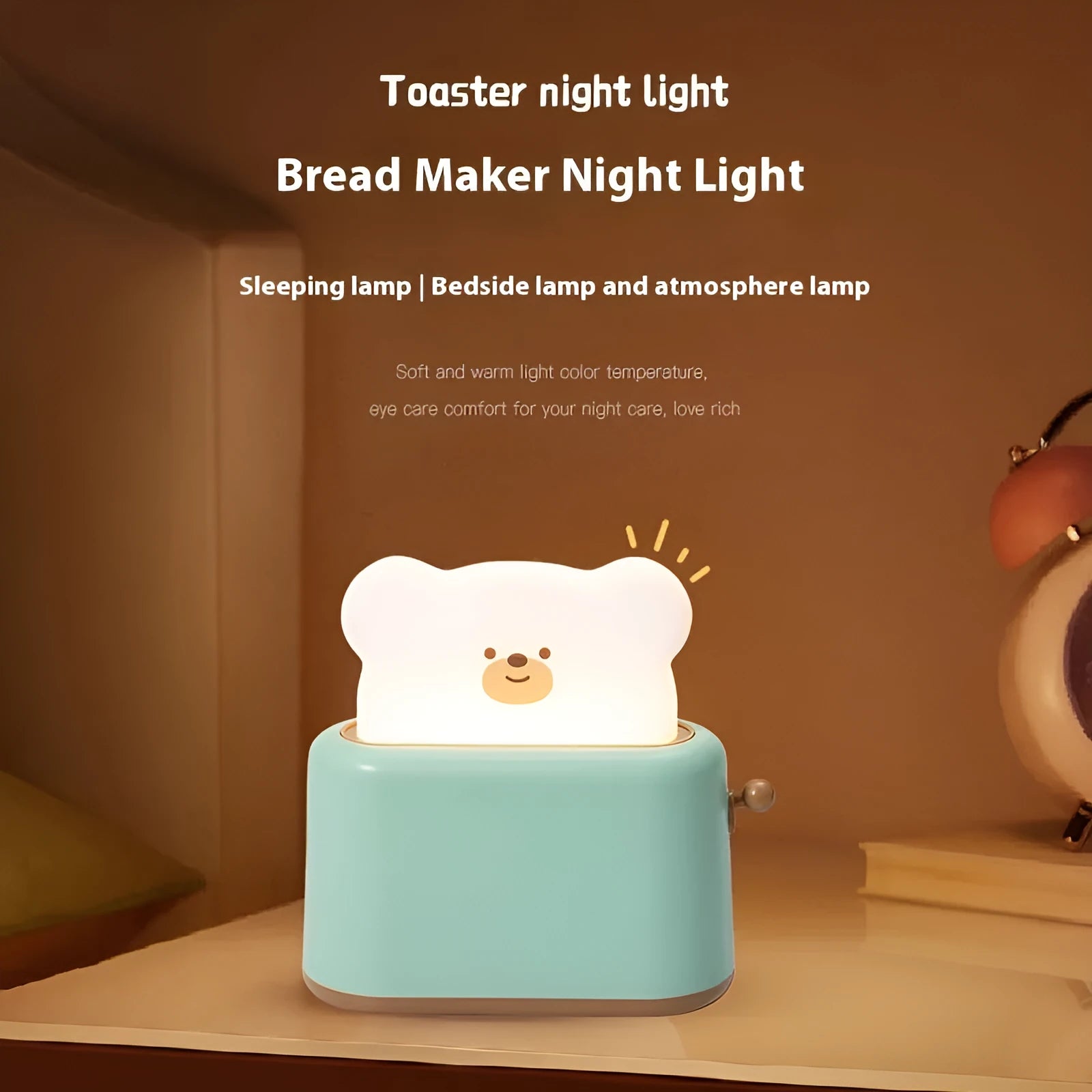 Bread bear shaped silicone night light with warm yellow glow on a desk