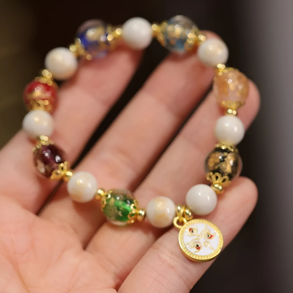 Handmade fragrant grey porcelain bracelet with gods of wealth charm and 10mm geometry beads