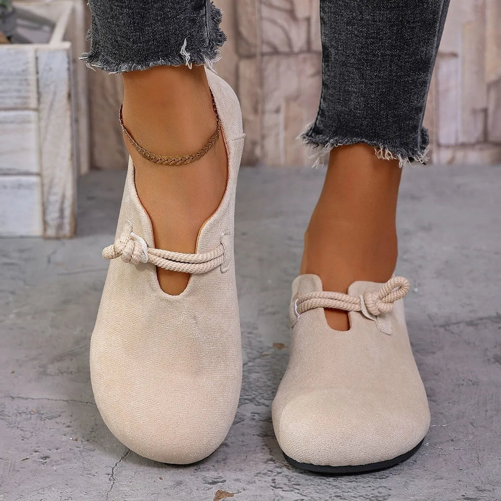 Round head slip-on solid colour flat shoes with suede upper and low rubber sole in beige colour