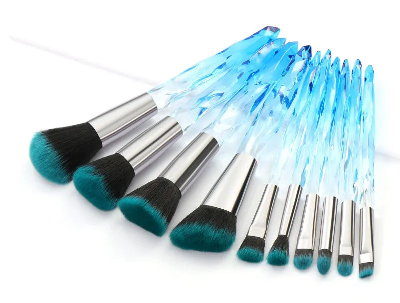 10 clear crystal foundation brushes with diamond shank handles and artificial fibre bristles.