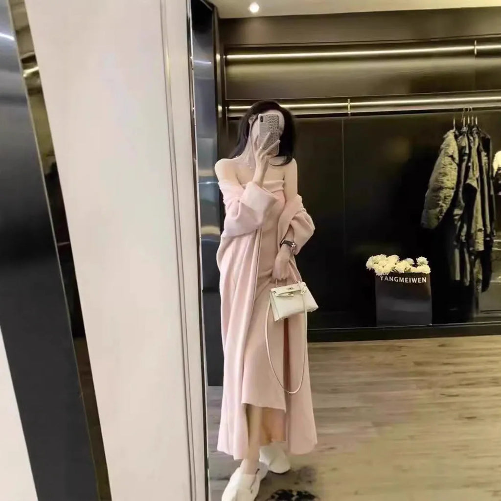 Women's grey knitted cardigan dress suit set with long skirt and flocking detail.