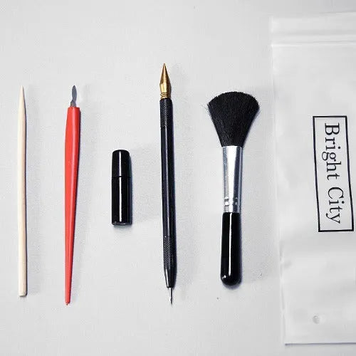 Scratch painting tool set with healing pen, scrapers, brushes, and photo frame accessories