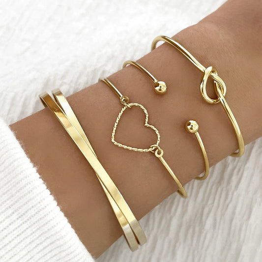 Vintage gold crystal heart letter love bangle bracelet set for women featuring four stylish designs