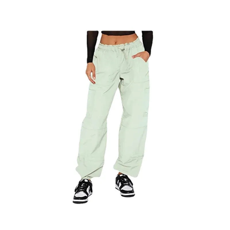 Men's loose-fit straight-leg cargo casual trousers in black with multiple utility pockets on the legs.