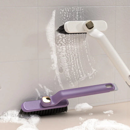 Multi-function rotating crevice cleaning brush in purple, white, and brown for kitchen and bathroom cleaning