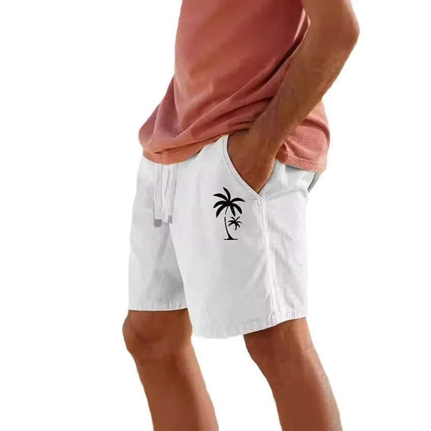 Men's white drawstring shorts with colourful heat transfer beach print of plants and flowers