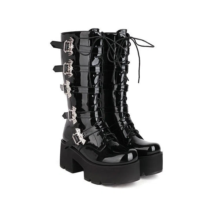 Women's chunky heel thigh-high boots in black patent leather with side zipper and round toe