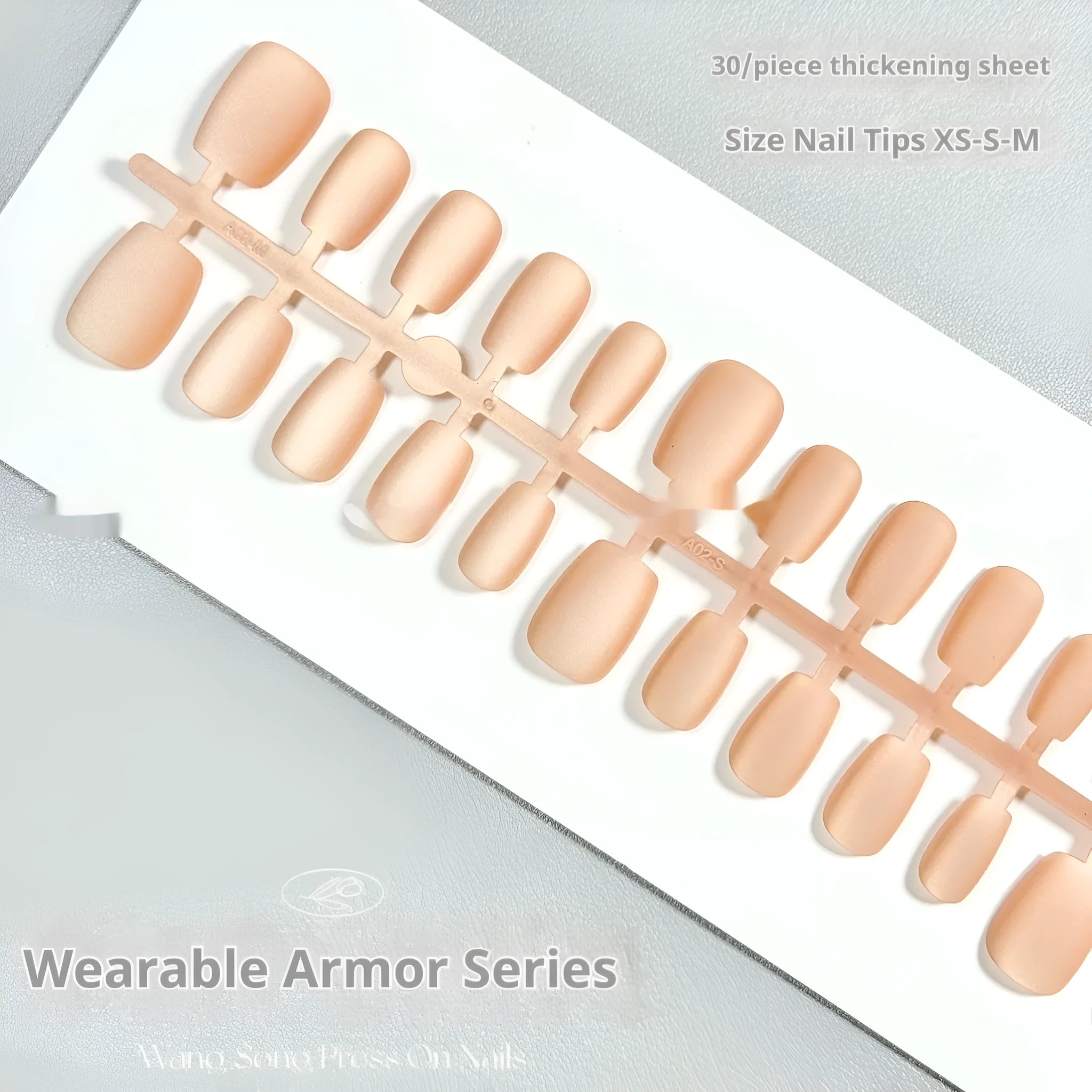 Set of frosted velvet false nails with Cat's Eye and Aurora armour design in short ladder sizes on a card.