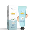 Bottle of Curdling Sunscreen Moisturising Liquid Foundation in a natural colour shade shown with a droplet.