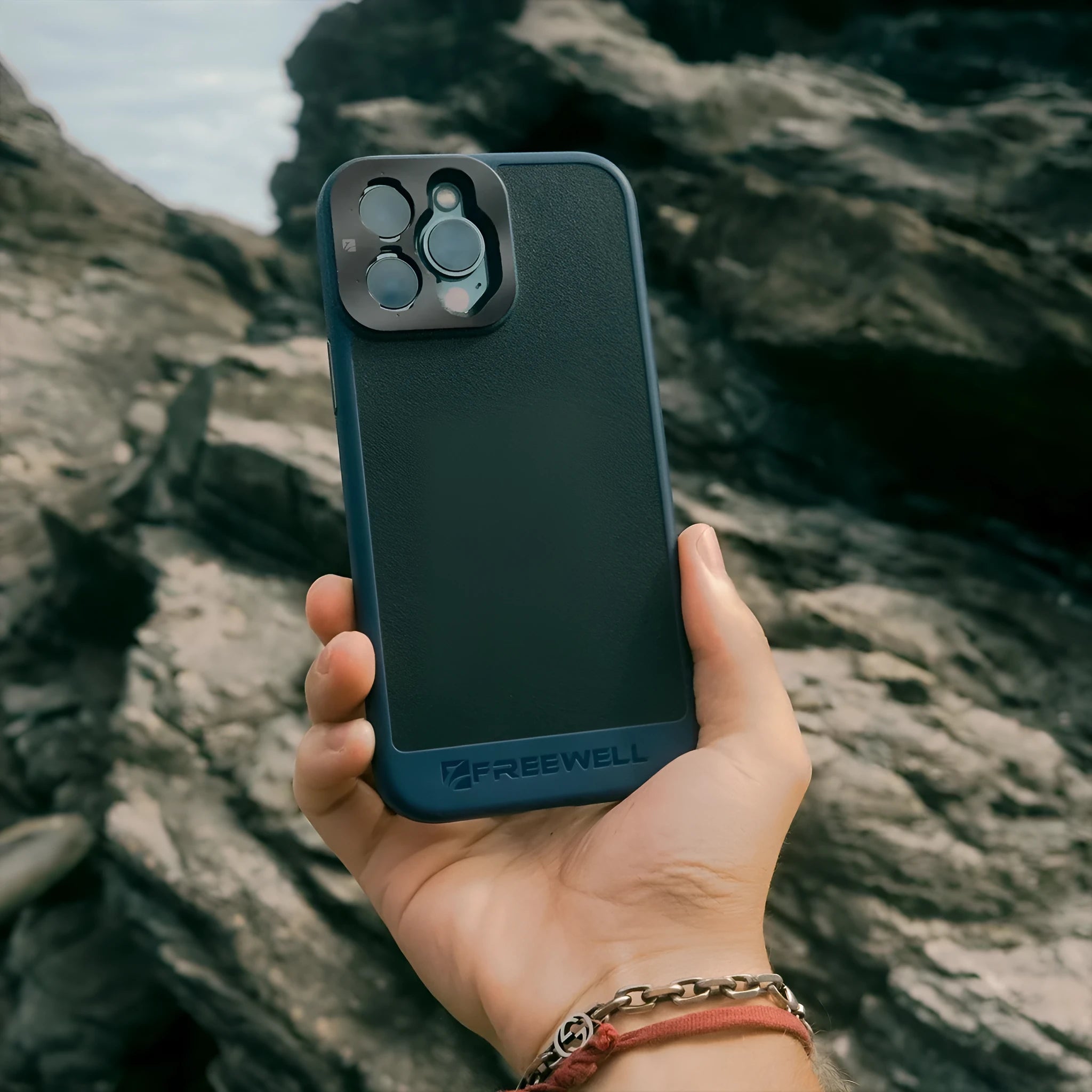 Black protective phone case compatible with iPhone 13 Pro, 14 Pro, and 15 Pro models.